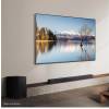 Angled view of the Samsung Q600F beneath a flat-screen TV