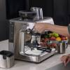 Close-up of assisted tamping system on Sage Barista Express Impress