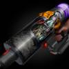 Dyson V15 Detect Extra cordless vacuum showing dust sensor and bin emptying system