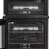 Freestanding Hotpoint HTG6GDCB1 cooker with glass lid and four-burner hob