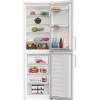 Indesit fridge freezer with doors open showing internal storage
