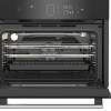Interior view of Blomberg built-in microwave oven with shelf and grill