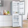 Interior view of Bosch KGN34NLEAG showing adjustable glass shelves and MultiBox drawer