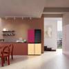 LG MoodUP fridge freezer in vibrant LED colour mode with modern kitchen backdrop