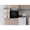 Lifestyle image of Indesit IO233XUK integrated into a modern kitchen setting