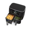 Ninja Dual Zone Air Fryer cooking two meals simultaneously – vegetables and chips