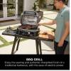 Ninja OG901UK Woodfire Pro Connect XL Electric BBQ Grill & Smoker on a patio