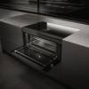 Open oven view of Elica Lhov with extra-wide cavity and sliding guides