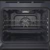 Open view of Indesit IO253BUK showing spacious 71L interior and shelving