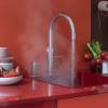 Polished Chrome Quooker Fusion Round Tap delivering hot, cold, boiling, chilled and sparkling water