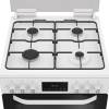 White Hotpoint dual fuel cooker with double ovens and gas hob