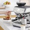 Touchscreen interface of Sage Barista Touch Impress displaying coffee drink presets