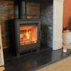 Woodford Pankhurst Ecodesign stove showing steel body and cast iron door