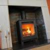 Woodford Pankhurst Medium wood burner with clean glass and modern finish