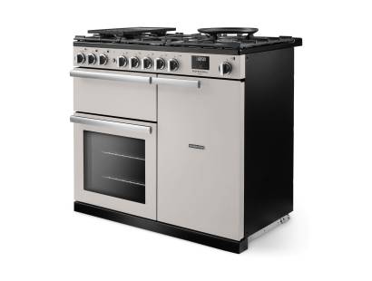 Angled view of Rangemaster Professional Deluxe 100 Ivory Range Cooker showing contemporary styling