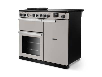 Angled view of Rangemaster Professional Deluxe 100 Ivory Range Cooker showing contemporary styling