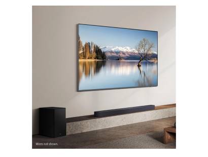 Angled view of the Samsung Q600F beneath a flat-screen TV