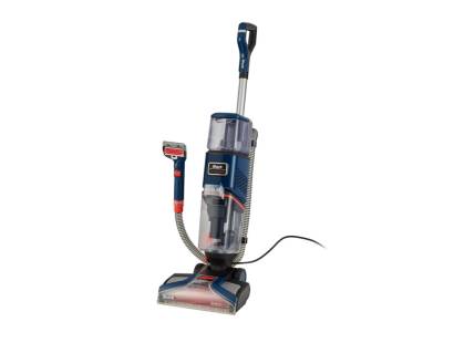 Angled view showing handheld spot remover attached