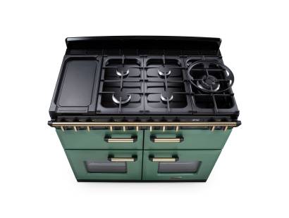 Close up of the dials on the Rangemaster 110cm classic deluxe dual fuel range cooker with chrome trim