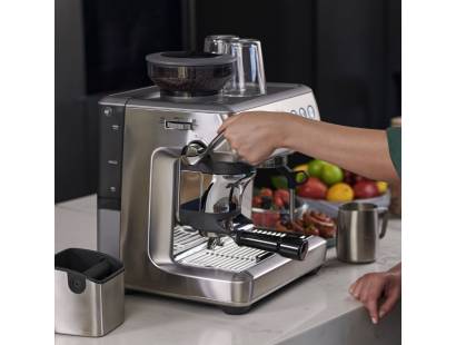 Close-up of assisted tamping system on Sage Barista Express Impress