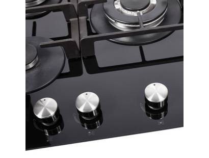 Close-up of central wok burner with cast iron supports