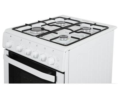 Close-up of four gas burners and enamel pan supports