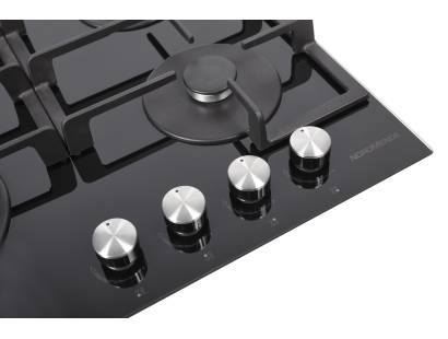 Detail of stainless steel control knobs and front panel