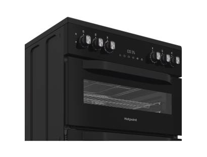Freestanding Hotpoint electric double cooker with glass control panel