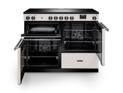 Front view of Rangemaster Professional 110 Ivory Induction Range Cooker showing oven doors and controls