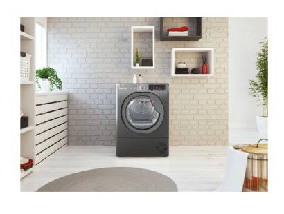 Graphite finish Hoover HLEC8TRGR tumble dryer in kitchen setting