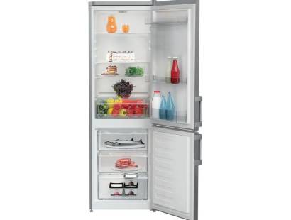 Indesit 6040 fridge freezer with doors open showing internal storage