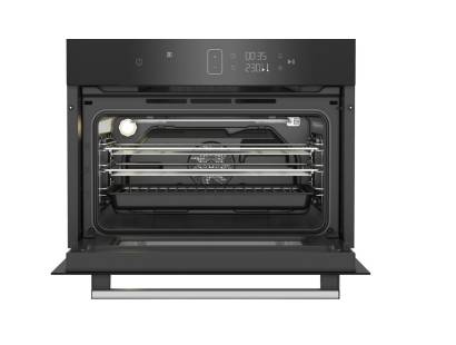 Interior view of Blomberg built-in microwave oven with shelf and grill