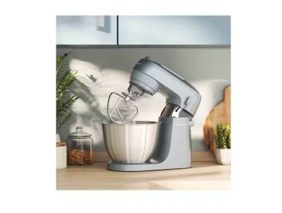 Kenwood Go Stand Mixer in Storm Blue on kitchen counter in use