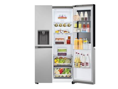 LG 635L InstaView™ refrigerator with doors open showing spacious storage