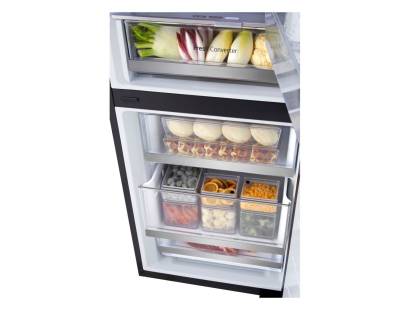 LG InstaView fridge freezer open showing freezer compartments
