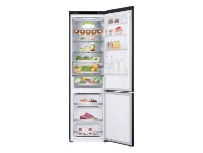 LG fridge freezer doors open showing large chiller, fridge and freezer compartments