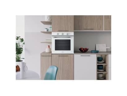 Lifestyle image of Indesit IO232HW integrated into a white kitchen unit