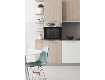 Lifestyle image of Indesit KFWS3844HIXUK integrated into a modern stainless steel kitchen