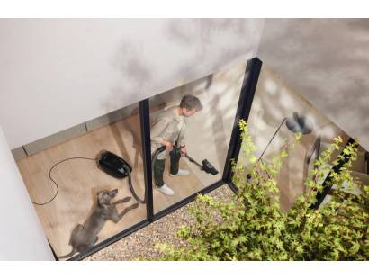 Miele Guard M1 C&D Flex cleaning in a modern room
