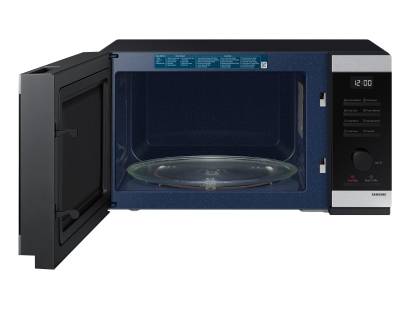 Open microwave showing ceramic enamel interior and large 32L capacity