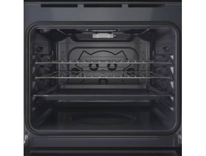 Open view of Indesit IO232HBUK showing oven interior with shelves and lighting