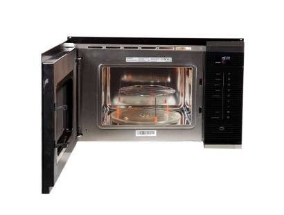 Open view of NM20IX showing 25.5cm turntable inside the microwave cavity
