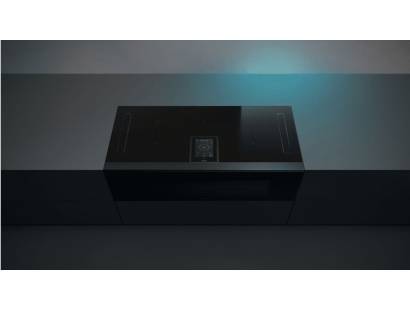 Overhead view of Elica Lhov showing flush-fit black glass hob and touchscreen display