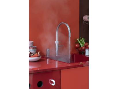 Polished Chrome Quooker Fusion Round Tap delivering hot, cold, boiling, chilled and sparkling water