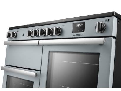Rangemaster Professional 110 Misty Blue Induction Range Cooker close-up view of control knobs and LED touch display fascia