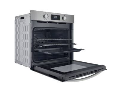 Side open view of Indesit IO253XUK with tilting grill and simple dial controls