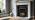 Flavel hearth inset electric fire black finish in home setting