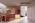 LG MoodUP fridge freezer in vibrant LED colour mode with modern kitchen backdrop